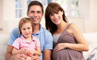 Family Planning Service - picture of the family with the pregnant lady, husband and there child